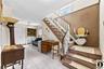 Lovely Entry Level Has a Large Storage Area/ Greeting for Guests