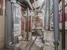 Utilities with gas water heater and a heating unit