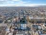 Aerial view of property's location with nearby urban area