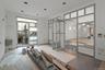 Unfurnished living room featuring baseboards