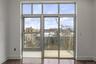 Doorway featuring plenty of natural light and wood finished floors