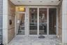 Doorway to property with a patio area