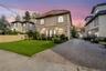 Mediterranean / spanish-style home featuring a tile roof and driveway