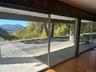 Doorway featuring wood finished floors and a mountain view