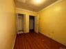 Unfurnished bedroom with dark wood finished floors and a closet