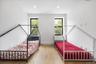 Bedroom with wood finished floors and recessed lighting