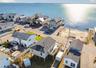 Aerial perspective of house with unobstructed water view