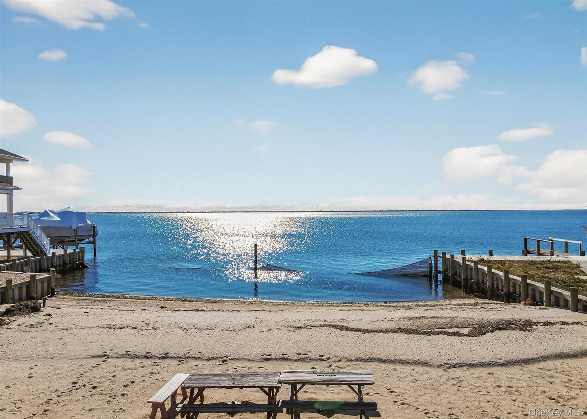 Aerial view of water and beach from home