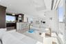 Living area featuring recessed lighting, visible vents, ceiling fan, and plenty of natural light