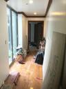 Hallway with ornamental molding, hardwood / wood-style flooring, and recessed lighting