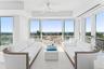 Living area with ceiling fan, french doors, plenty of natural light, and recessed lighting
