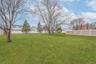 View of fenced backyard