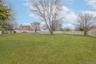 View of fenced backyard
