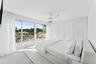 Bedroom featuring access to outside, light wood finished floors, and ceiling fan