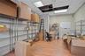 Home office featuring wood finished floors and a paneled ceiling