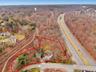 Aerial overview of property's location featuring property parcel outlined
