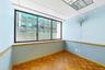 Spare room featuring baseboards and a paneled ceiling