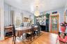 Dining area with a chandelier and light wood finished floors