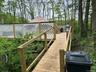 Dock area with a gazebo and a wooden deck