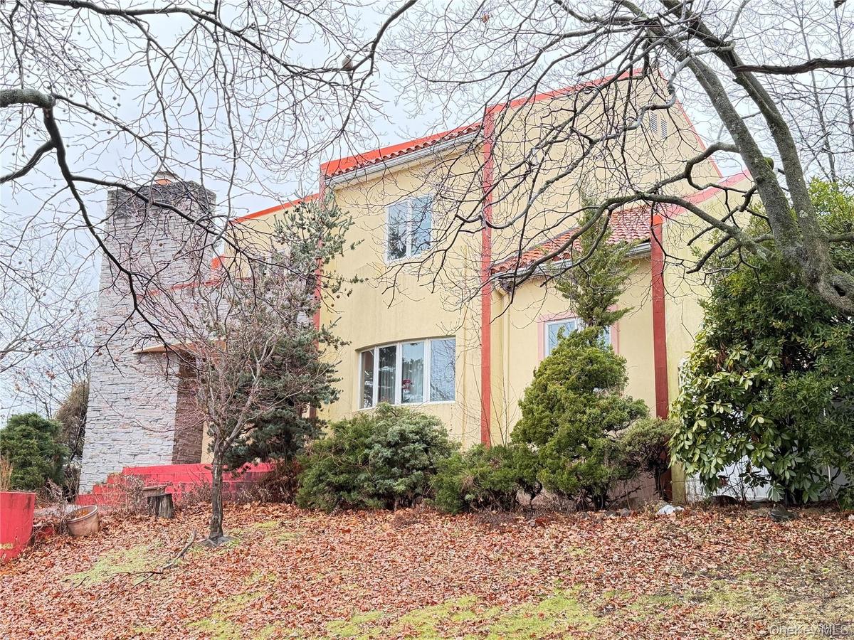 View of side of property with stucco siding