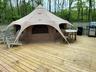 Wooden deck featuring area for grilling