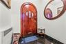 Entryway featuring granite floors and baseboards