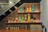 Bar with display shelves