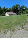 View of front of house with a front lawn