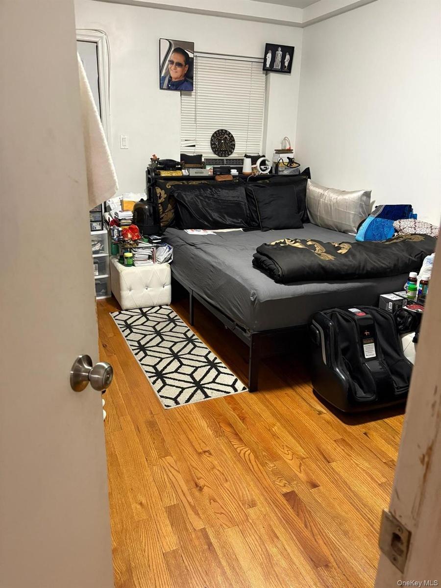 Bedroom featuring light wood-type flooring