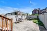 Fenced backyard featuring a patio and outdoor dining area