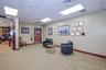Executive office lobby with a paneled ceiling