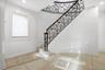 Stairway featuring recessed lighting