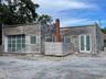 Back of property with french doors