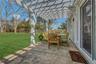 View of patio featuring a pergola and outdoor dining