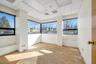 Empty room with a drop ceiling