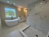 Photos of primary bathroom with similar look and finishing