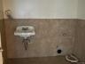 Bathroom featuring tile walls and tile patterned floors