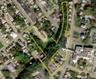 Aerial overview of property's location featuring property parcel outlined