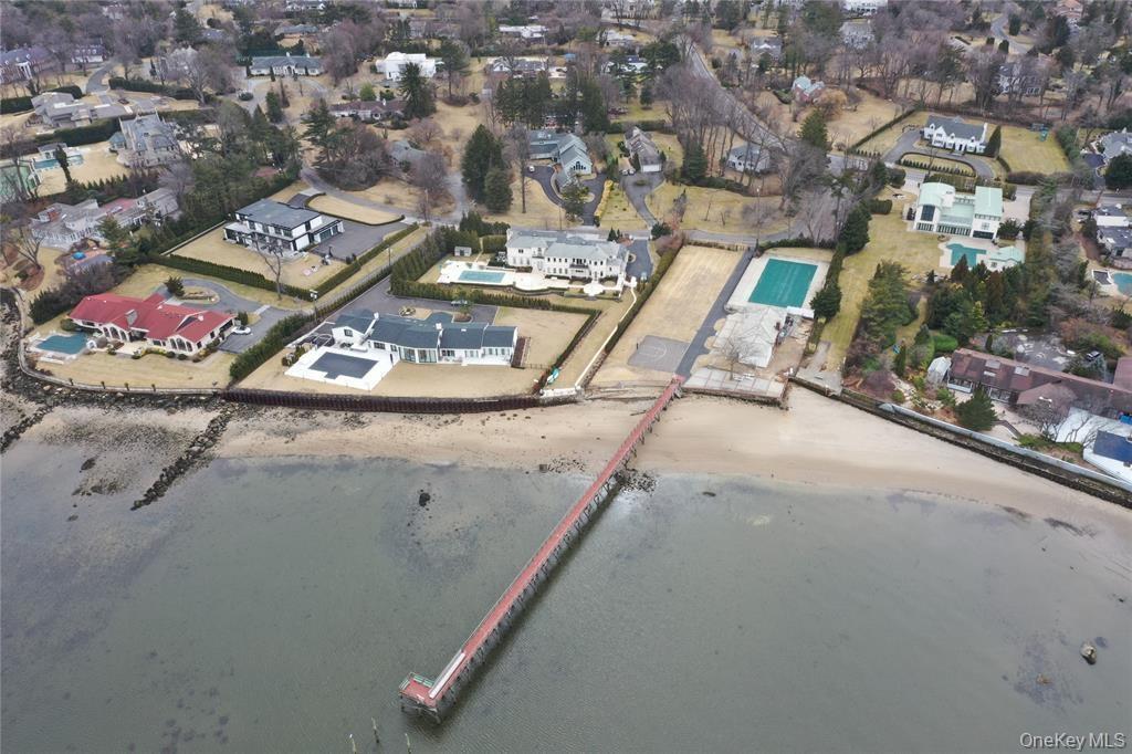 Aerial view of property's location featuring a pool