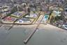 Aerial view of property's location featuring a pool