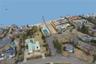 Aerial overview of property's location featuring nearby suburban area