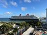 From your eighth floor apartment, you can watch the boats, the military vessels, and even the Disney Cruise lines