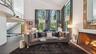 Main Living Area With Double Height Ceilings and Gas Fireplace