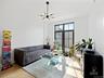 Living room featuring a chandelier