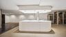 Kitchen with modern cabinets, white cabinetry, light countertops, and an island with sink