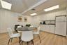 Dining room featuring a paneled ceiling and light wood finished floors
