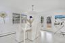 Dining space with light wood-style floors and a baseboard radiator