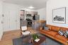 Living room with light wood-style flooring