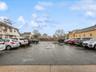 Uncovered parking lot with a residential view