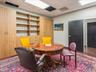 Dining area with built in shelves and a paneled ceiling